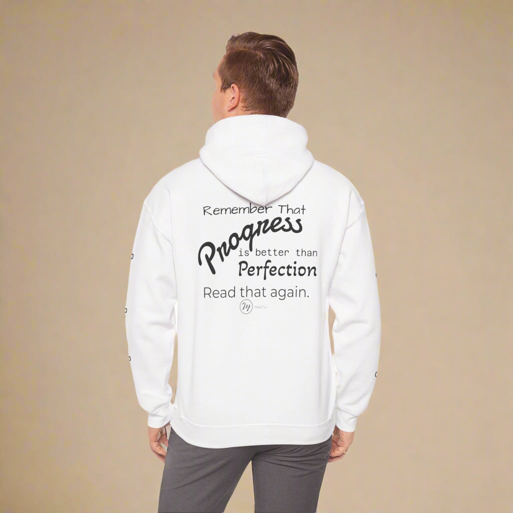 Man wearing white hoodie by Midal Core