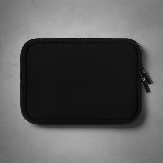 back of a motivational laptop/tablet sleeve on a table by midal core