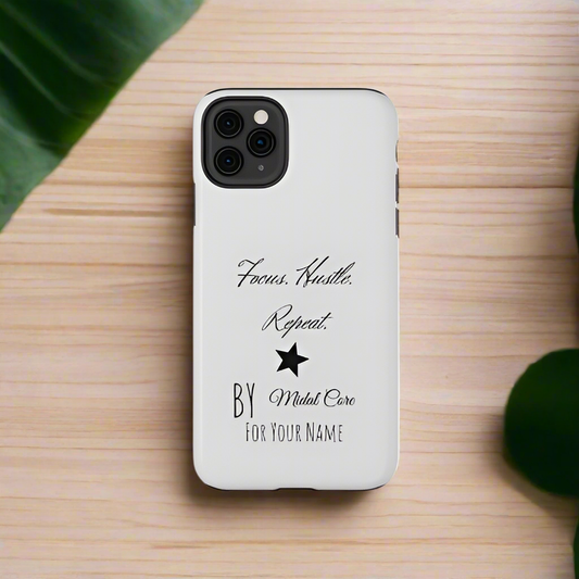 Front View of a motivational phone case posed on a wooden table for the iPhone 11 pro made by Midal Core