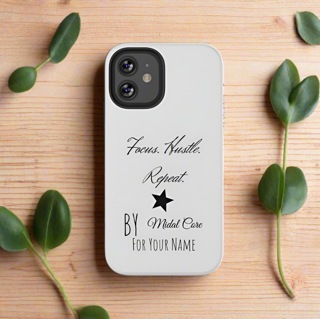 Front View of a motivational phone case posed on a wooden table for the iPhone 12 made by Midal Core