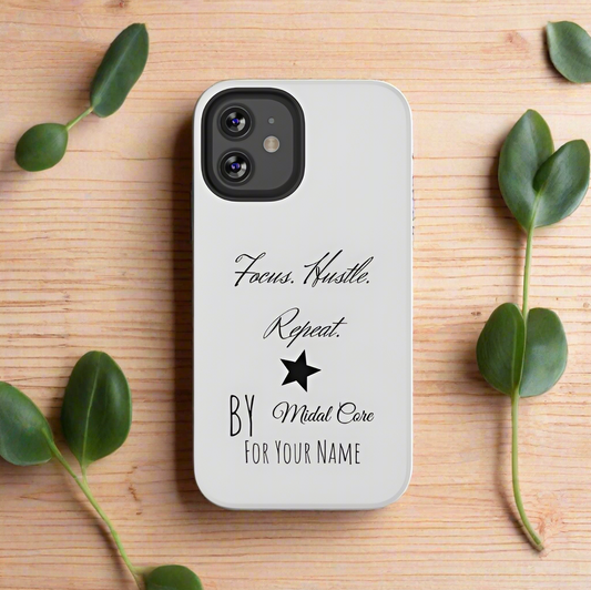 Front View of a motivational phone case posed on a wooden table for the iPhone 12 made by Midal Core