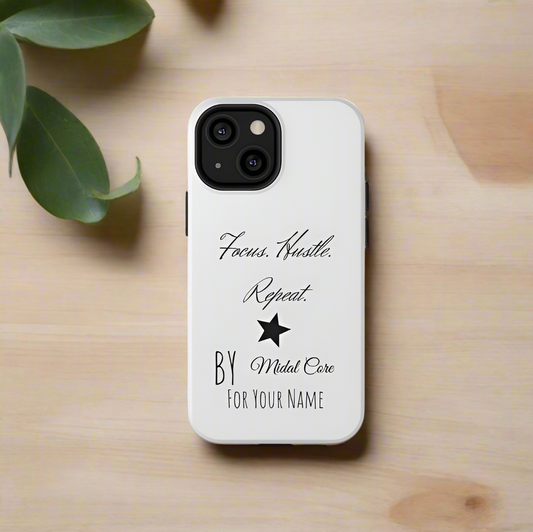 Front View of a motivational phone case posed on a wooden table for the iPhone mini made by Midal Core