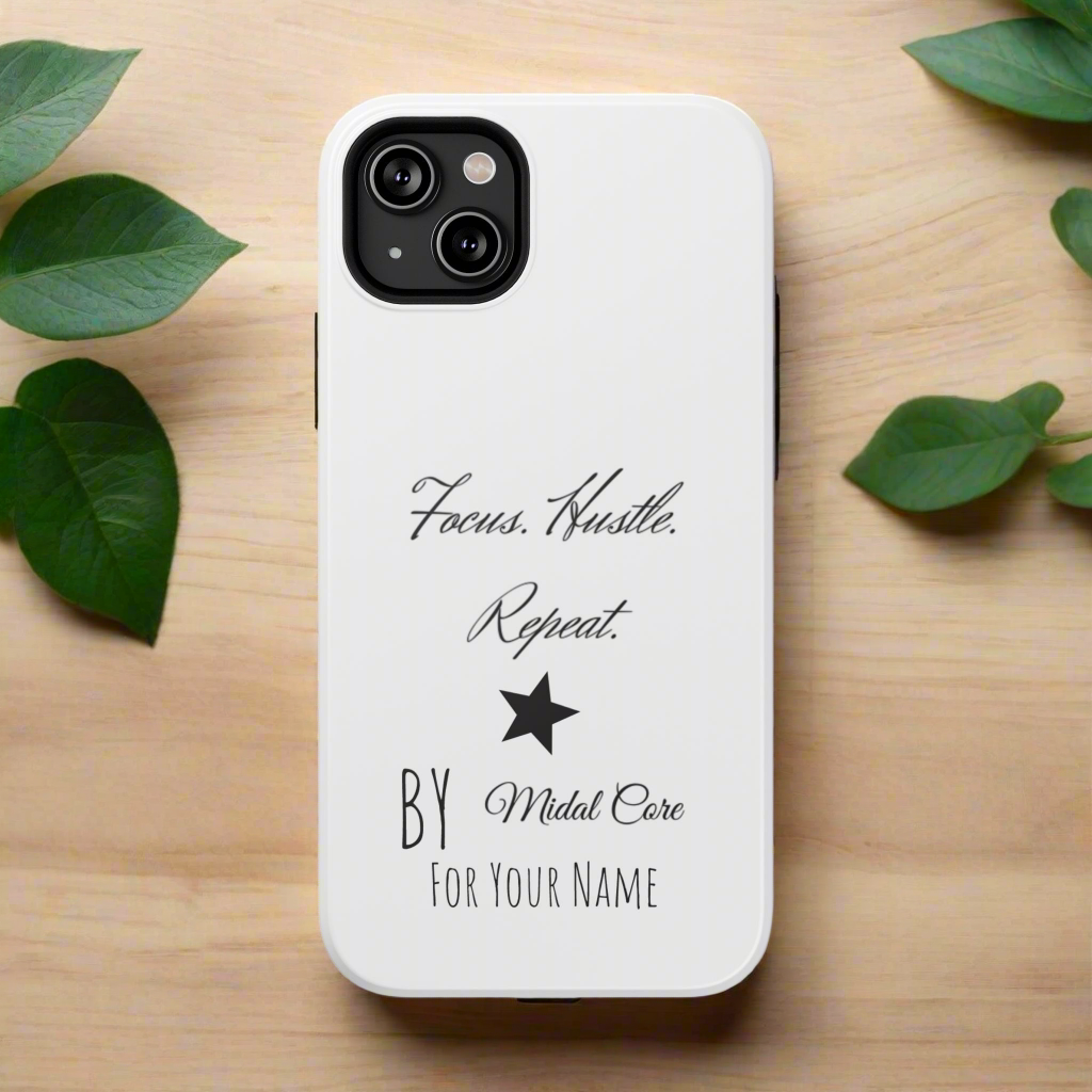 Front View of a motivational phone case posed on a wooden table for the iPhone 14 plus made by Midal Core