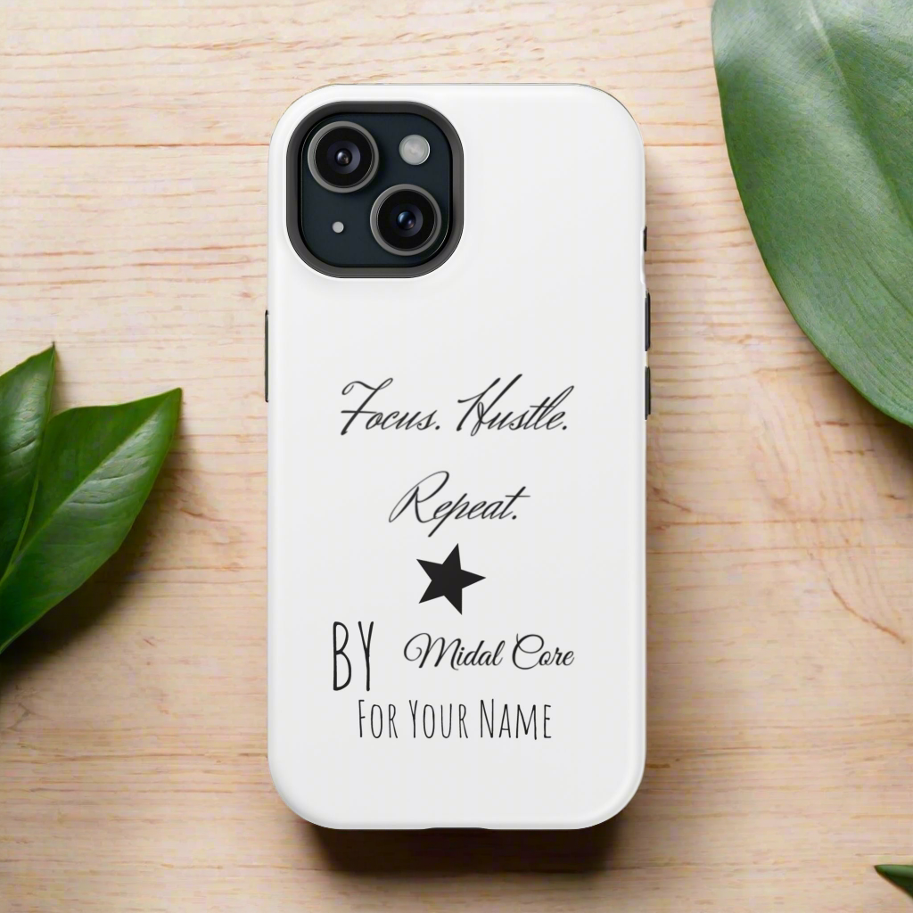 Front View of a motivational phone case posed on a wooden table for the iPhone 15 made by Midal Core