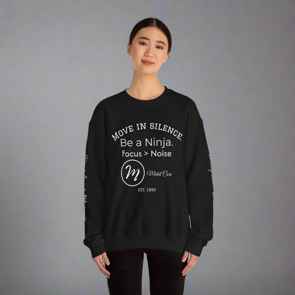 Female model wearing black Midal Core sweatshirt – front