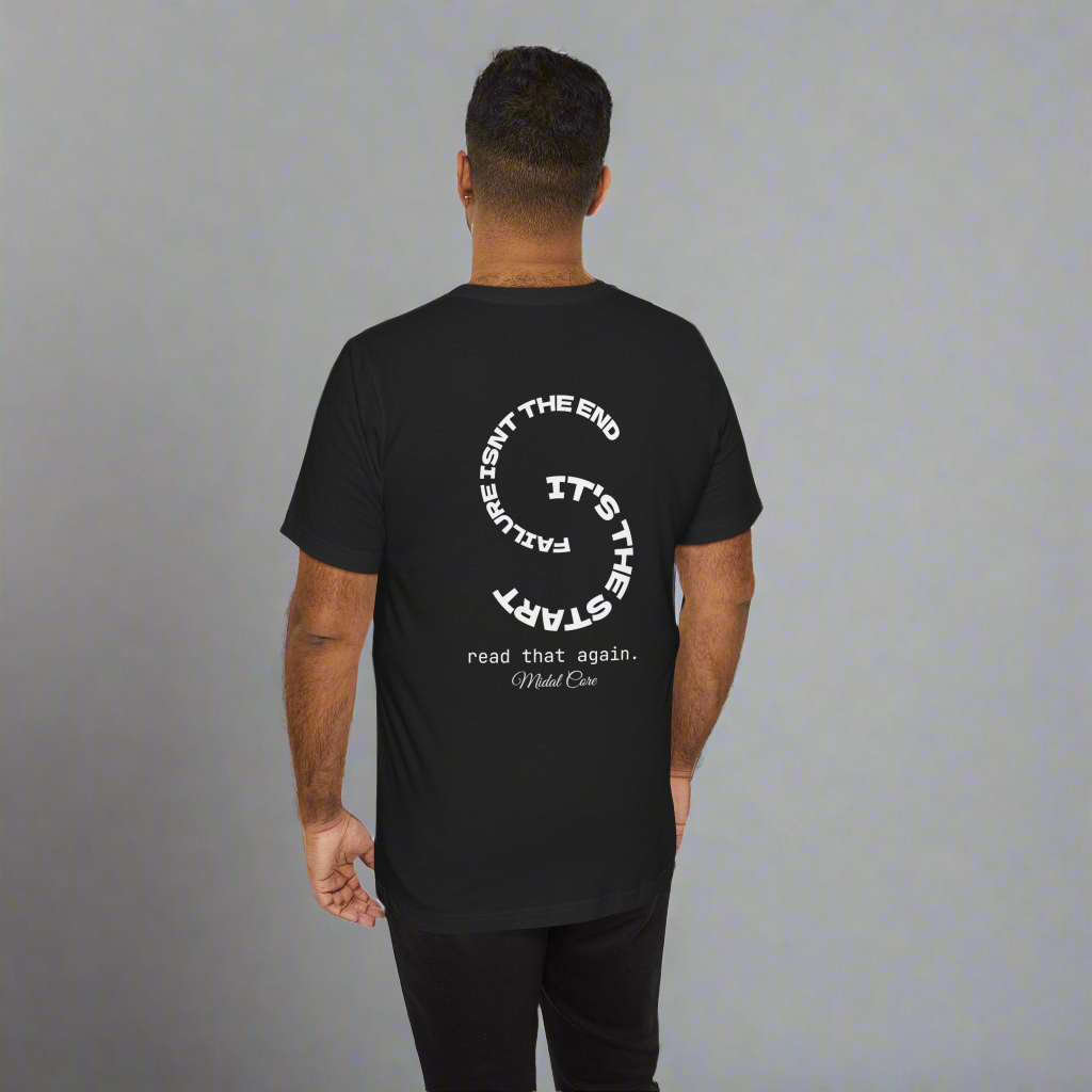 Back view of man wearing motivational black tee – Midalcore brand