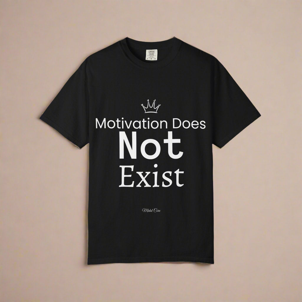Black "Motivation Does Not Exist" t-shirt folded on studio background