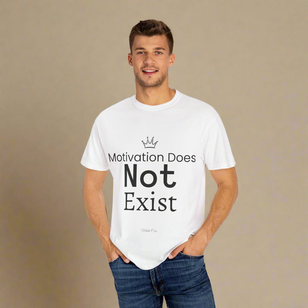 Man wearing white "Motivation Does Not Exist" t-shirt